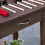 36'' Wooden Potting Bench Work Table with 2 Removable Wheels, Sink, Drawer & Large Storage Spaces, Brown - Image 7
