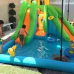 13 x 12 Ft Inflatable Double Water Slide Park with 480W Blower, Climbing Wall, Water Cannon, Basketball Hoop and Splash Pool - Image 8