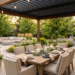 Elegant outdoor dining area beneath a modern pergola featuring a beautifully set dining table, comfortable cushioned chairs, and landscaped backyard.
